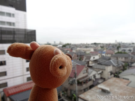 Raymond taking in Tokyo from our balcony in Setagaya