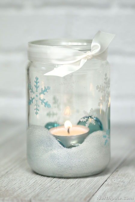 Add ribbon, glass gems, and candle