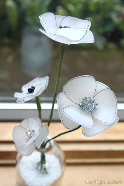 Make different flowers by using different colored beads or by outlining the petals.