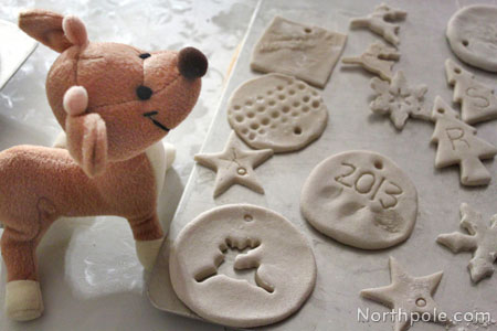 Raymond admiring the ornaments after they came out of the oven.