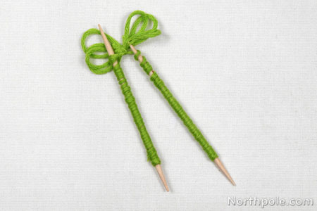 Wrap embroidery floss around toothpicks to make it curly